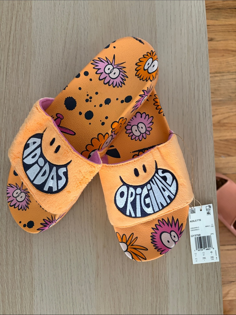 adidas Originals Orange Slide Sandals with Pink Floral Accents